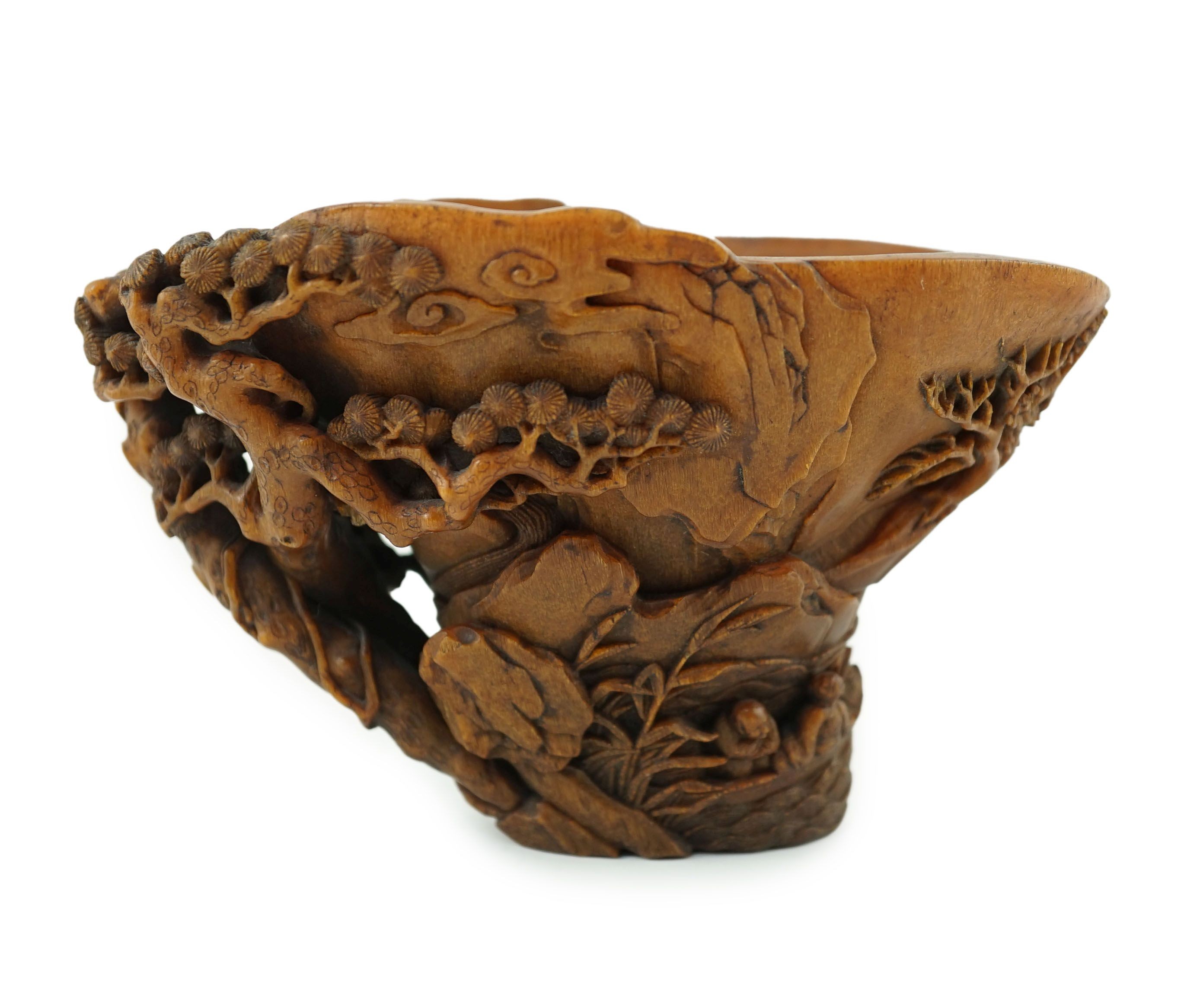A fine Chinese rhinoceros horn ‘Ode to the Red Cliff’ libation cup, 17th/18th century, 15.2cm long, 9.8cm high